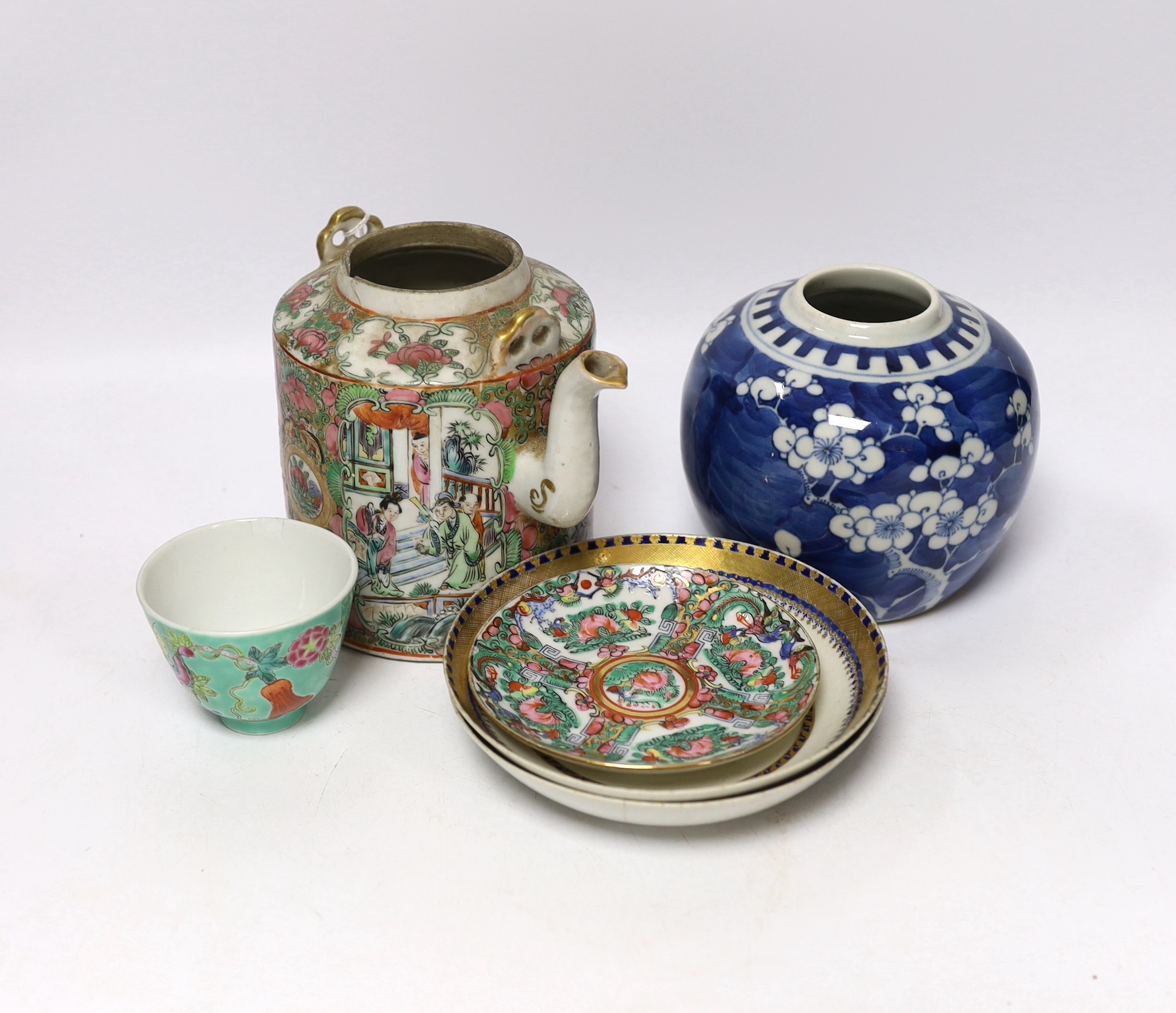A collection of Chinese ceramics including a blue and white prunus flower jar, a famille rose teapot and a turquoise ground tea bowl, largest 13.5cm high